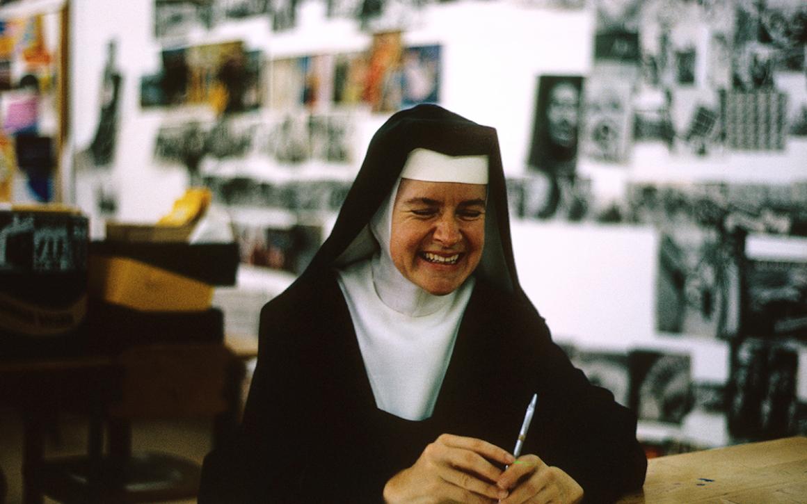 Photograph of AIGA Medalist Corita Kent in her studio